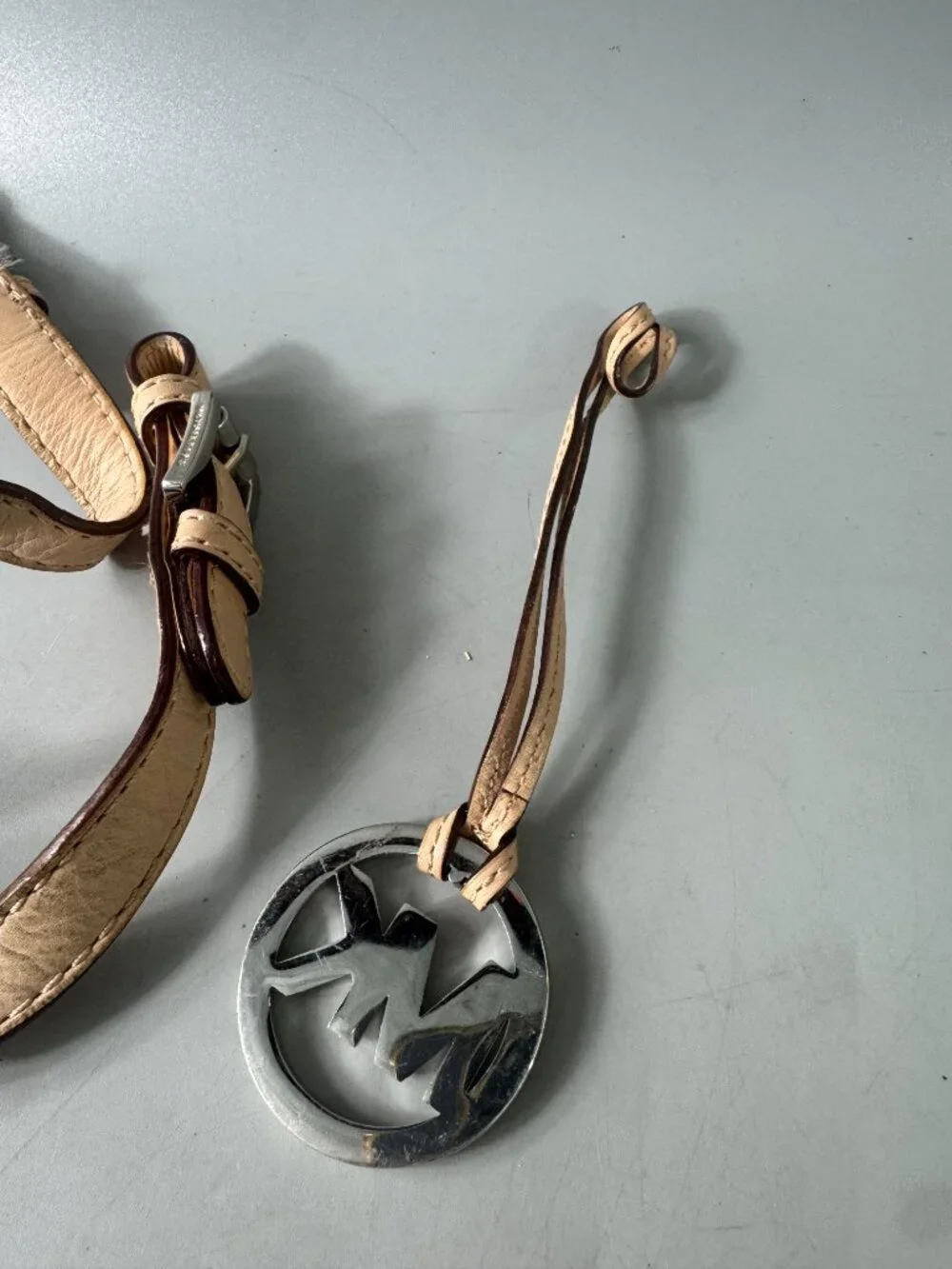 A Bundle of Michael Kors Tan Leather Double Straps w/ Silver-tone MK Logo Charm